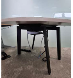 ZSS26020-Item 008-Round lamented meeting table with a recesed power-access box under a hinged wooden cover
